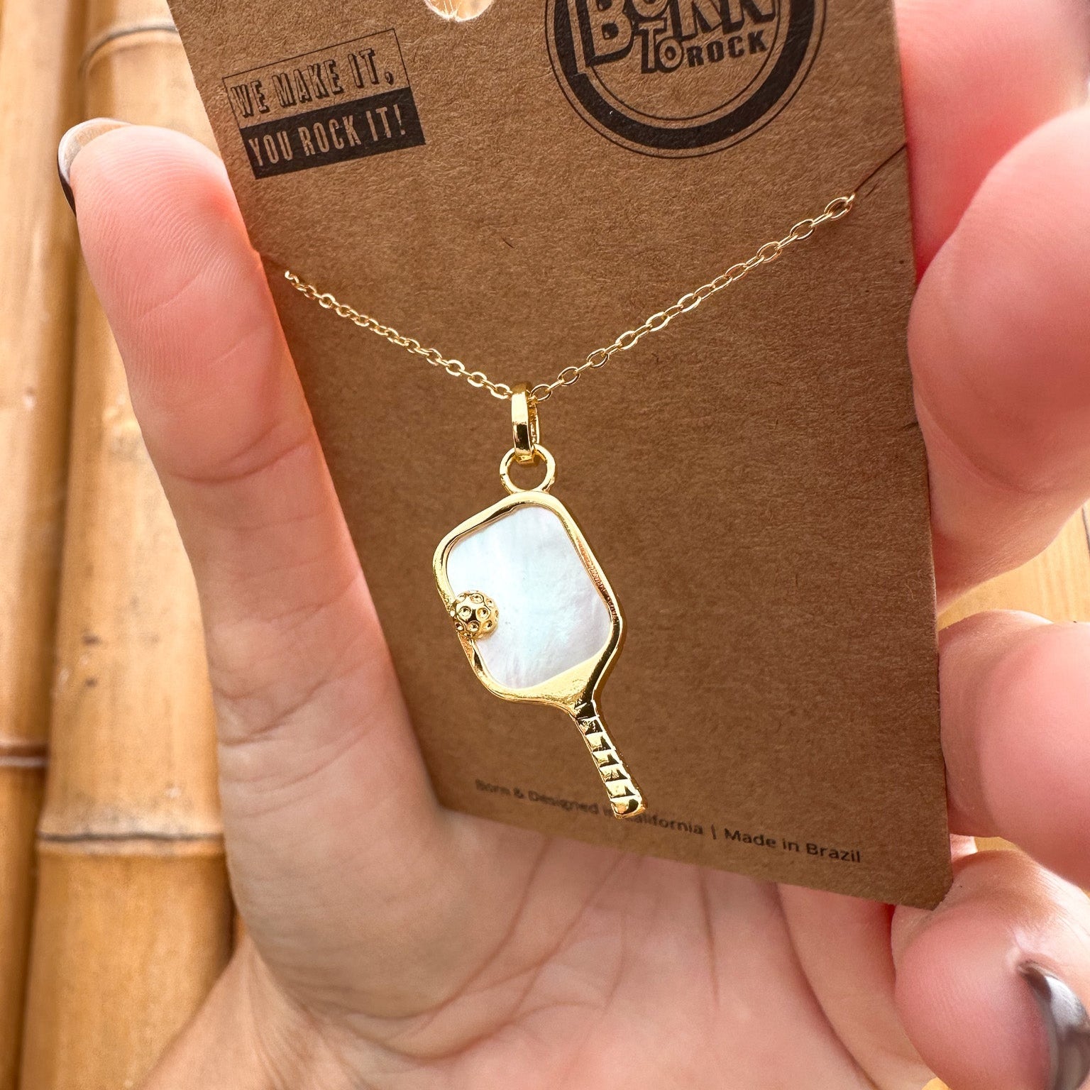 Gold Pickleball Paddle Pendant with a Mother of Pearl Pickleball Necklace – unique sports and pickleball jewelry gift for athletes, fans, teams, coaches, and players