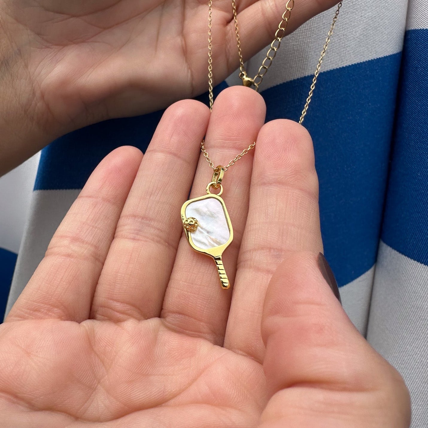 Gold Pickleball Paddle Pendant with a Mother of Pearl Pickleball Necklace – unique sports and pickleball jewelry gift for athletes, fans, teams, coaches, and players