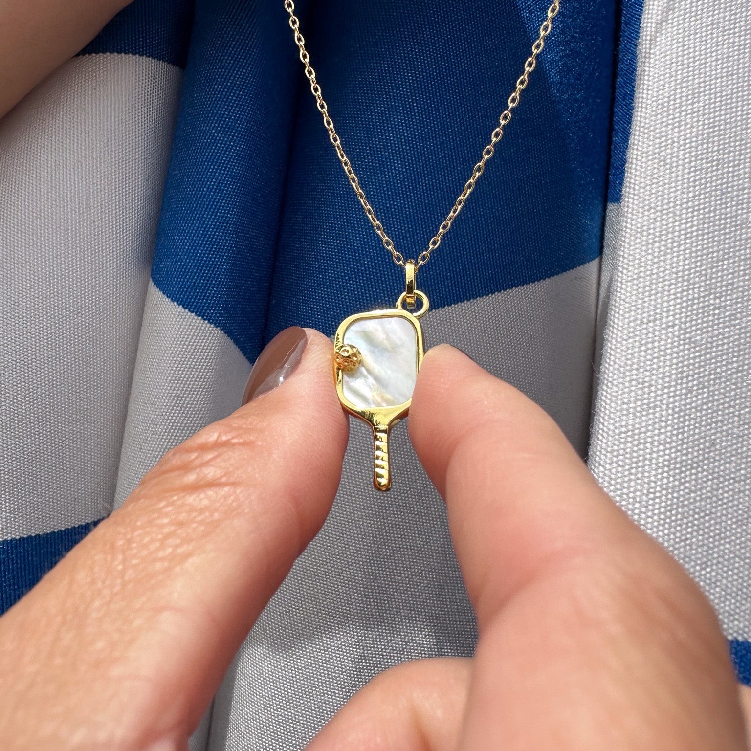 Gold Pickleball Paddle Pendant with a Mother of Pearl Pickleball Necklace – unique sports and pickleball jewelry gift for athletes, fans, teams, coaches, and players