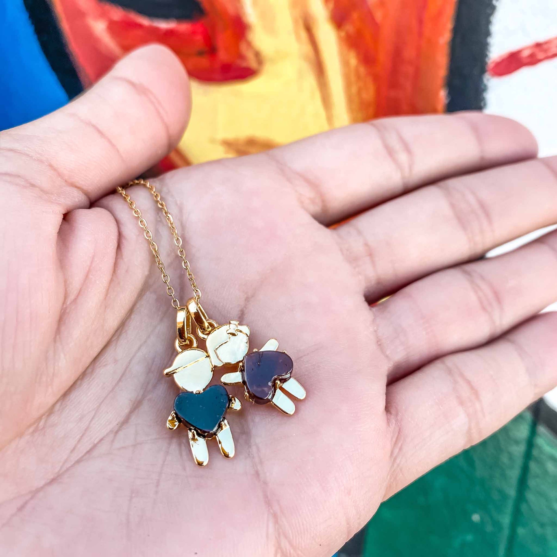 We're donating a $1 of each little girl and little boy pendants to "Pés Livres", which is providing food and education to more than 50 children in Tanzania, Africa.