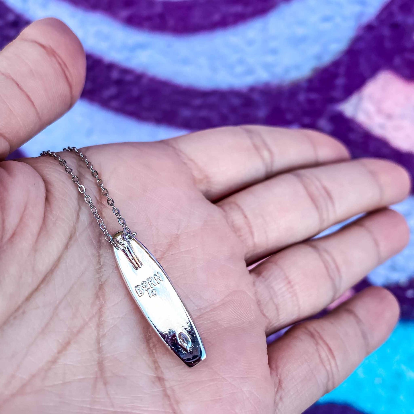Looking for places to buy or rent a paddle board? This stand up paddle board pendant will be the best and highest performance SUP you'll ever find. Take your paddle board with you, even when you're not surfing, racing or touring. Shop March's birthstone SUP jewelry online or at a surf shop near you.