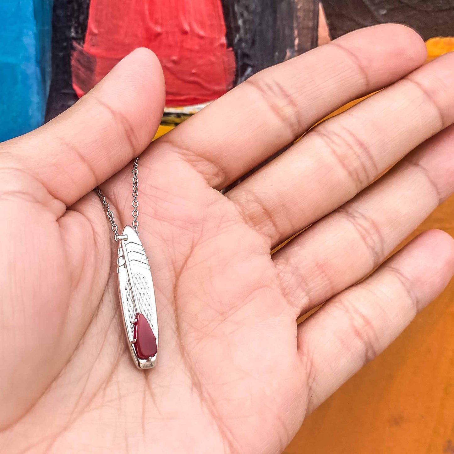Looking for places to buy or rent a paddle board? This stand up paddle board pendant will be the best and highest performance SUP you'll ever find. Take your paddle board with you, even when you're not surfing, racing or touring. Shop July's birthstone SUP jewelry online or at a surf shop near you.