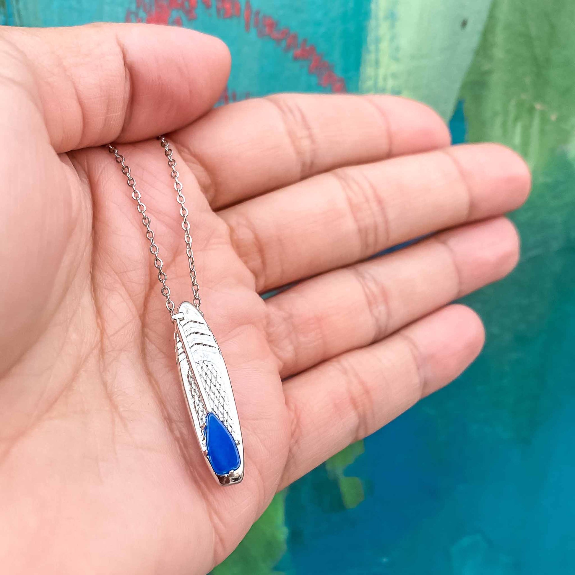 Looking for places to buy or rent a paddle board? This stand up paddle board pendant will be the best and highest performance SUP you'll ever find. Take your paddle board with you, even when you're not surfing, racing or touring. Shop September's birthstone SUP jewelry online or at a surf shop near you