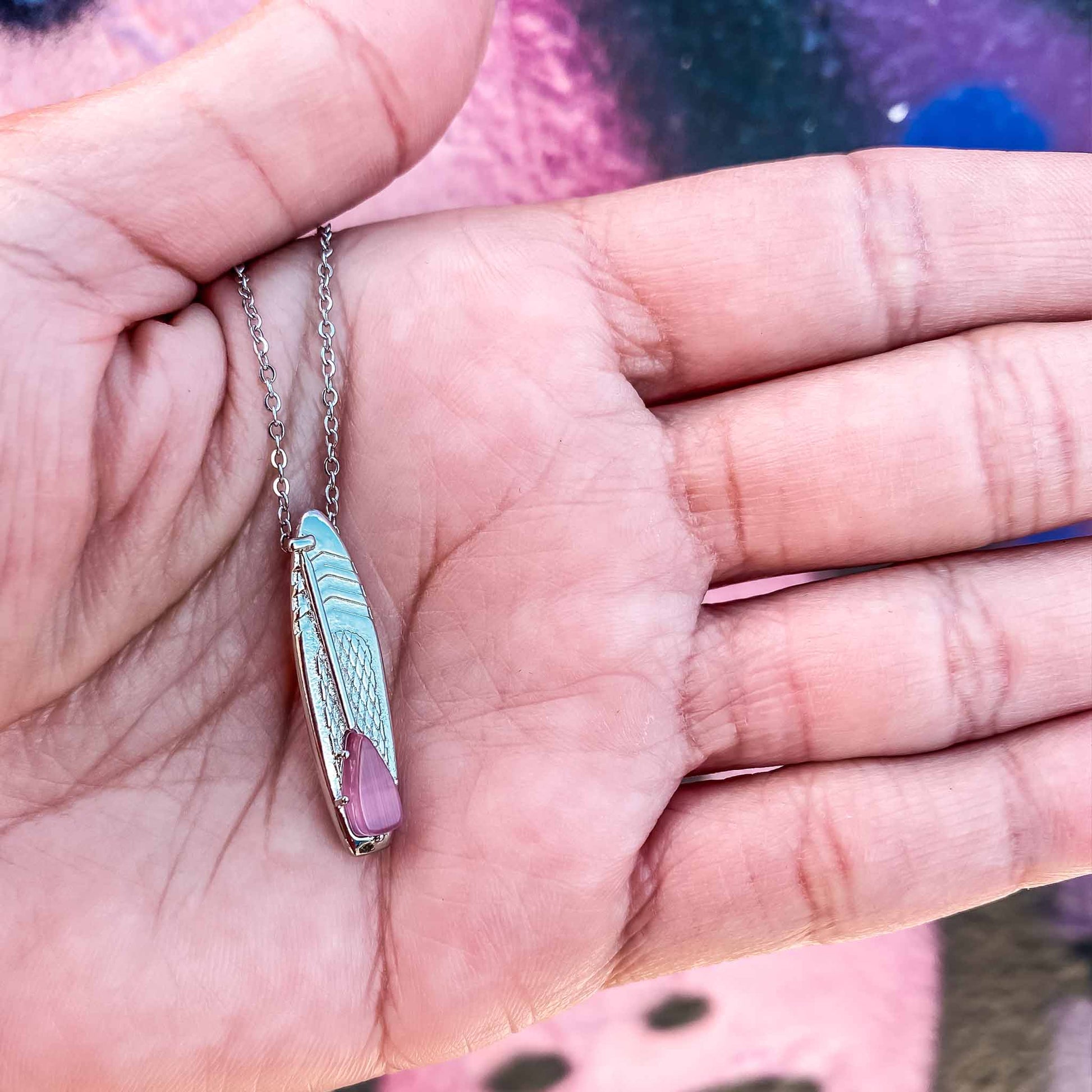 Looking for places to buy or rent a paddle board? This stand up paddle board pendant will be the best and highest performance SUP you'll ever find. Take your paddle board with you, even when you're not surfing, racing or touring. Shop October's birthstone SUP jewelry online or at a surf shop near you.
