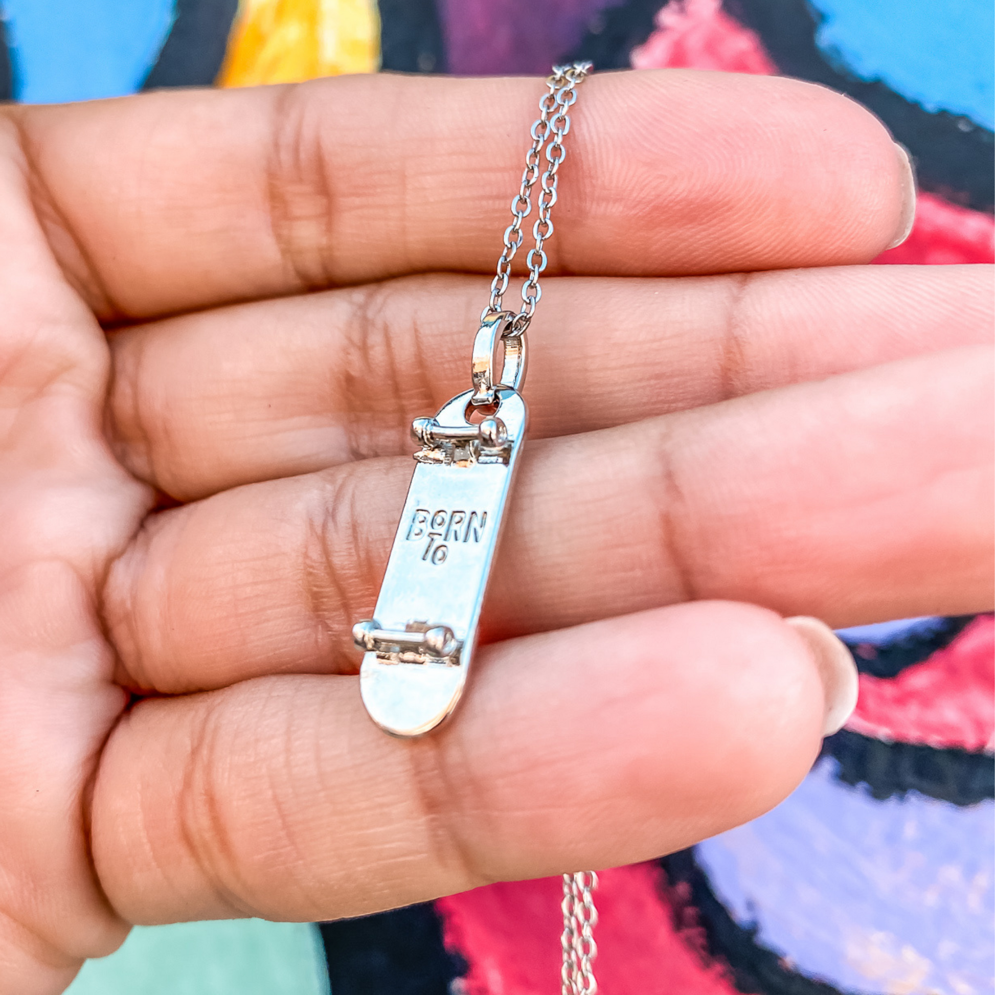 silver plated skateboard charm necklace handmade by born to rock jewelry