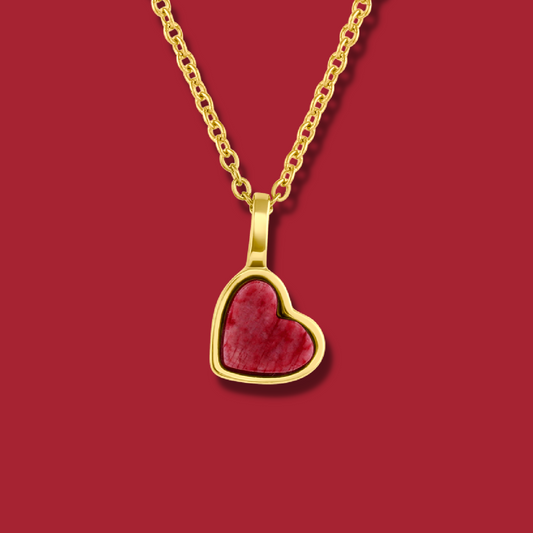 Yellow gold charm necklace with a heart shaped red feldspar natural gemstone. Made by Born to Rock. Online  jewelry store based in San Diego California