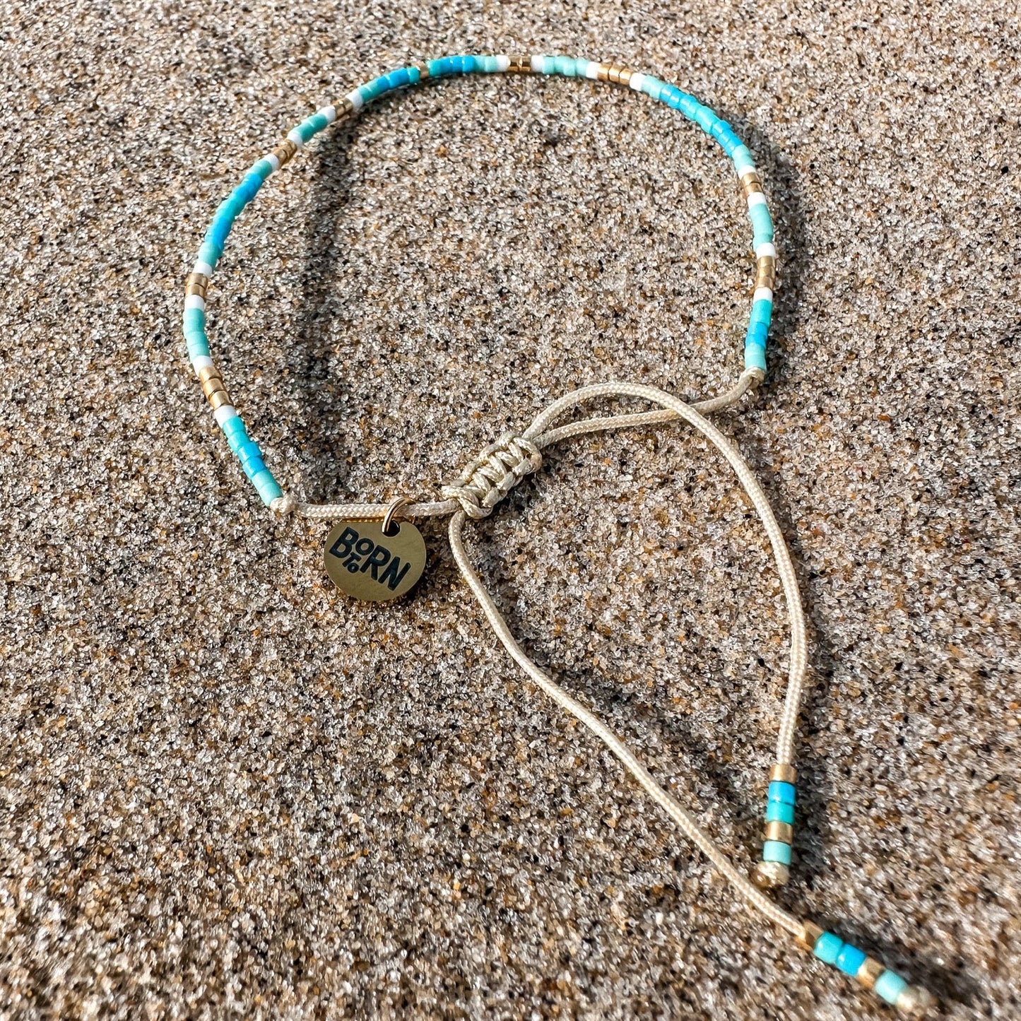 Beaded bracelet, adjustable bracelet made with colored beads, friendship bracelet, Surf Jewelry made by Born to Rock Jewelry, Family owned sports inspired and lifestyle jewelry brand based in San Diego, California