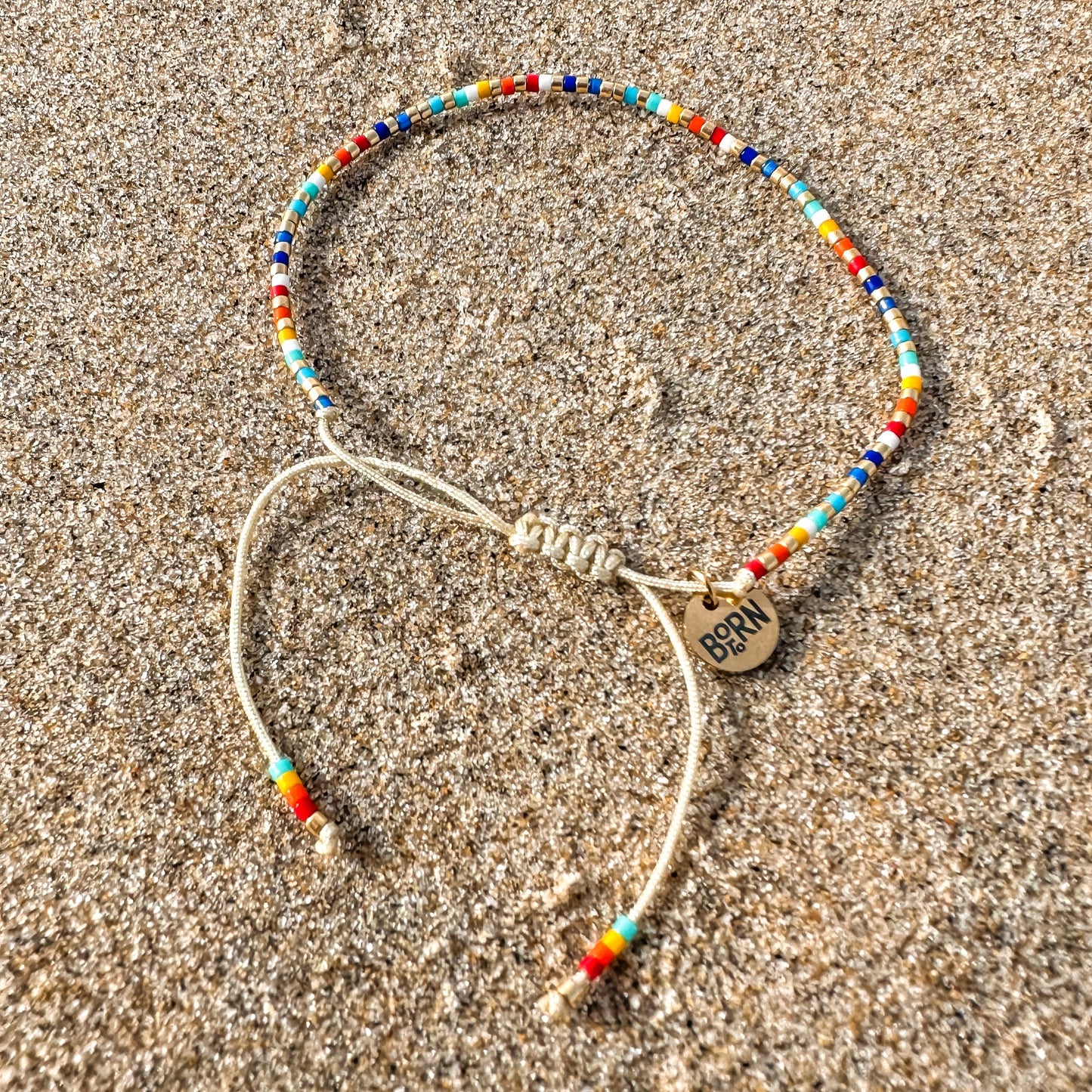 Beaded bracelet, adjustable bracelet made with colored beads, friendship bracelet, Surf Jewelry made by Born to Rock Jewelry, Family owned sports inspired and lifestyle jewelry brand based in San Diego, California