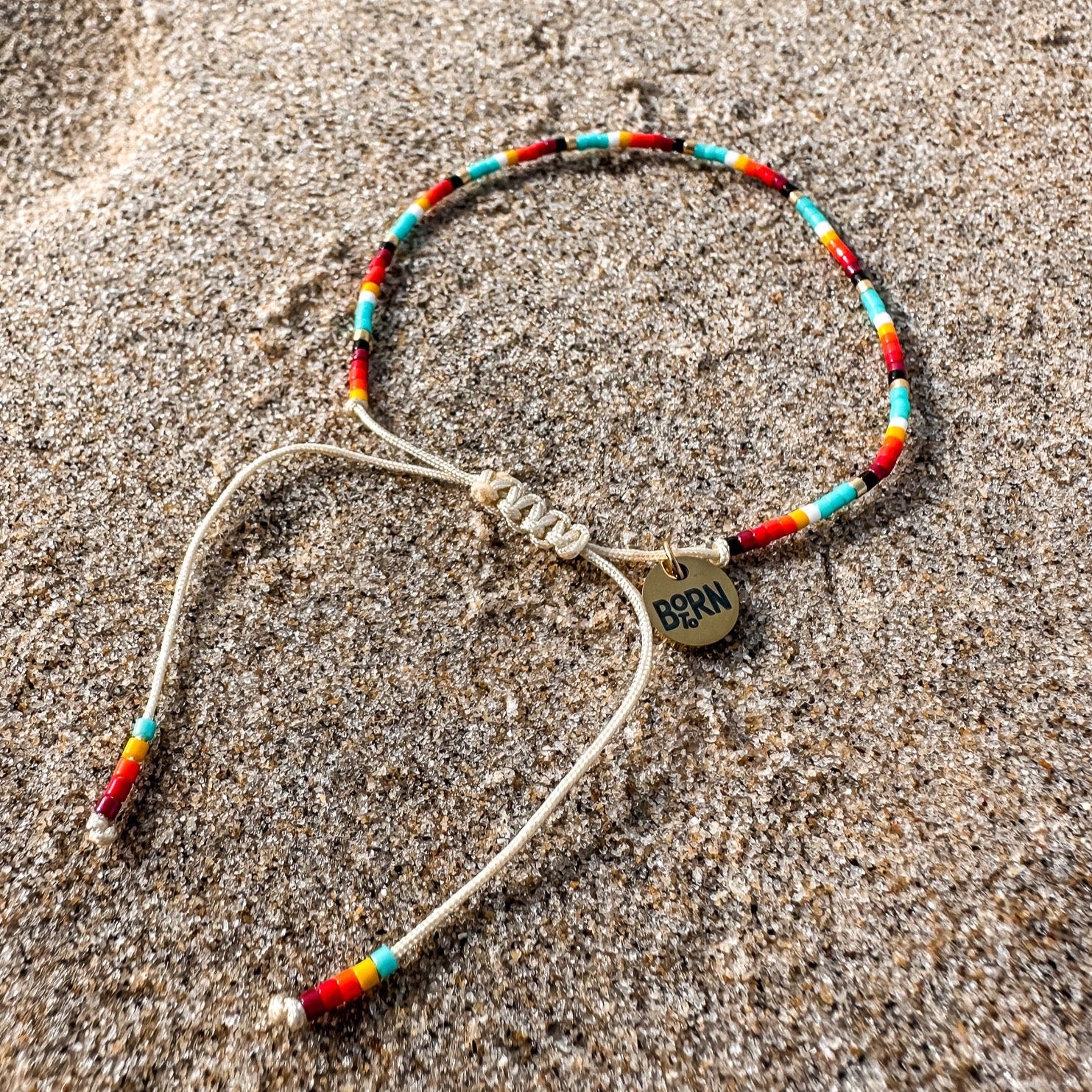Beaded bracelet, adjustable bracelet made with colored beads, friendship bracelet, Surf Jewelry made by Born to Rock Jewelry, Family owned sports inspired and lifestyle jewelry brand based in San Diego, California