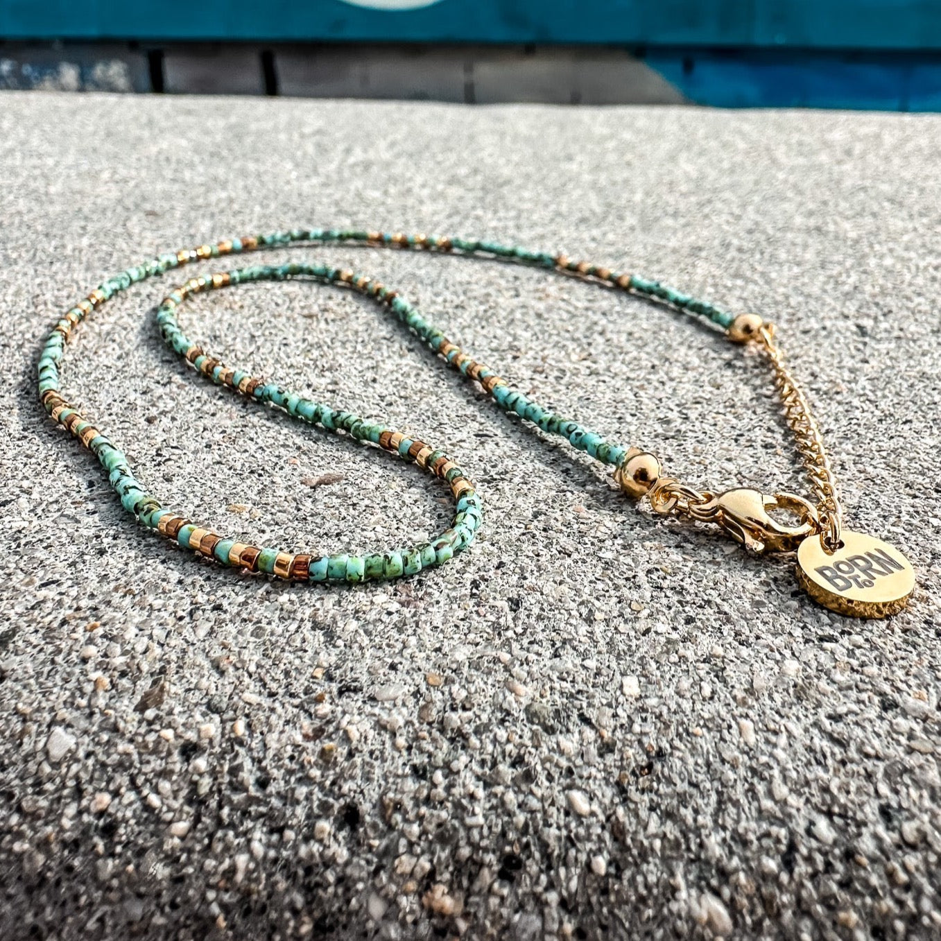 Handmade beaded necklace, adjustable necklace made with colored beads, layered necklaces, surf jewelry made by Born to Rock Jewelry, Family owned sports inspired and lifestyle jewelry brand based in San Diego, California