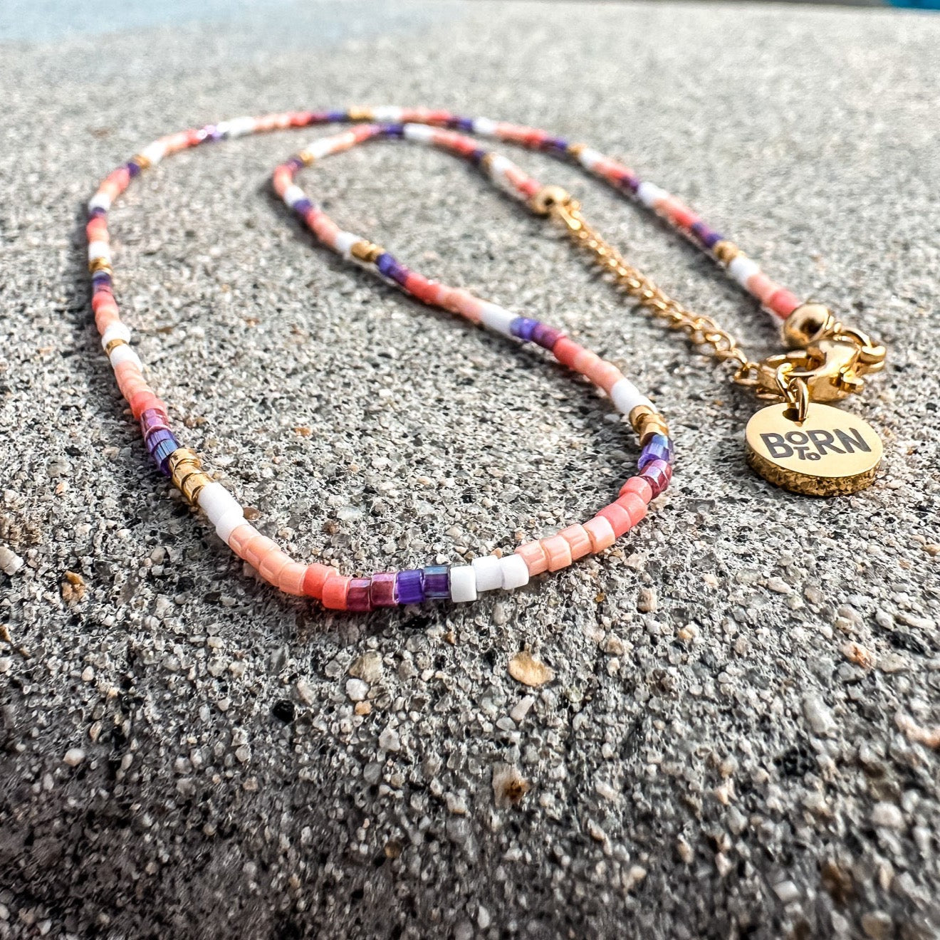 Handmade beaded necklace, adjustable necklace made with colored beads, layered necklaces, surf jewelry made by Born to Rock Jewelry, Family owned sports inspired and lifestyle jewelry brand based in San Diego, California
