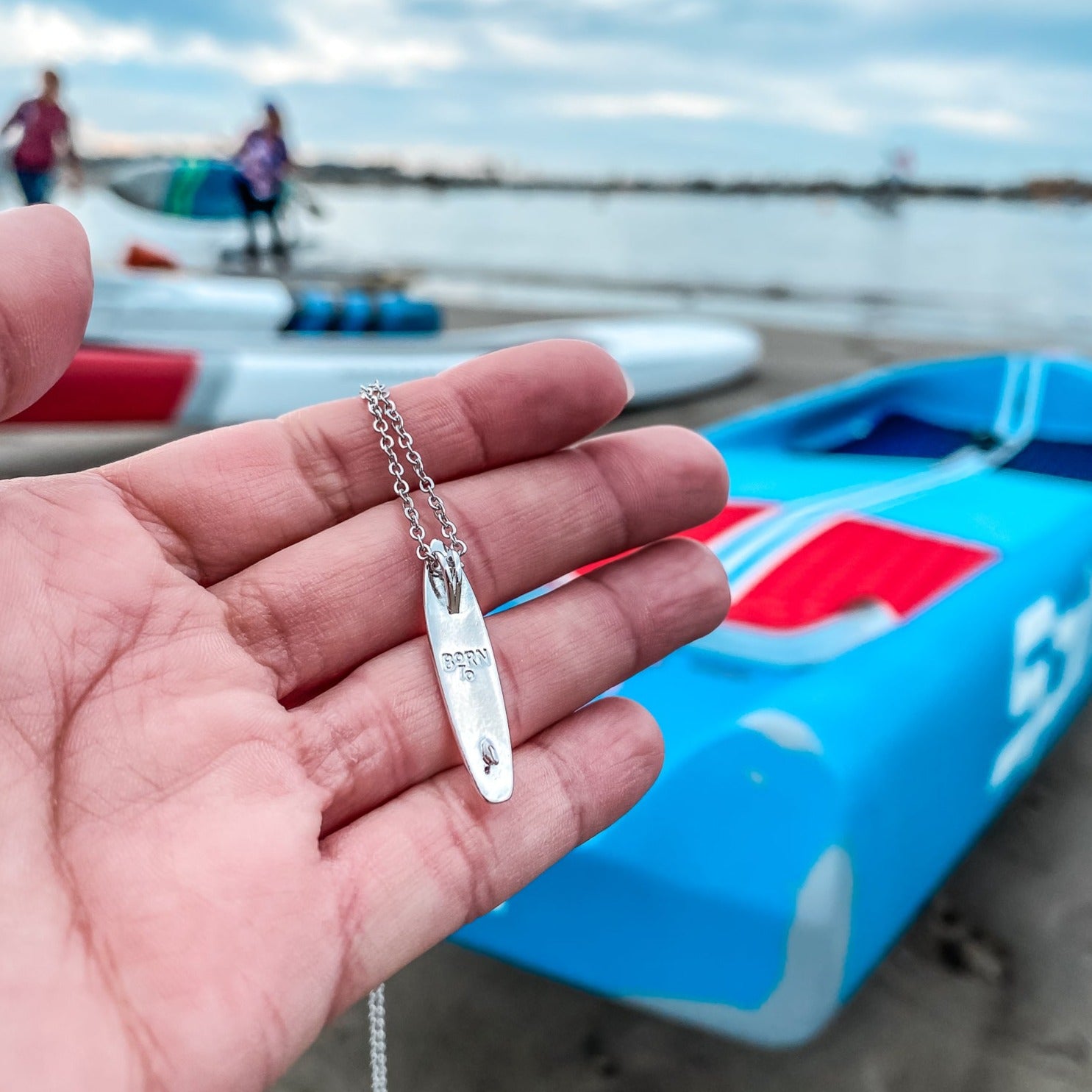 Jewelry for stand up paddlers. Looking for places to buy or rent a paddle board? This stand up paddle board pendant will be the best and highest performance SUP you'll ever find. Take your paddle board with you, even when you're not surfing, racing or touring. Shop SUP jewelry online or at a surf shop near you.