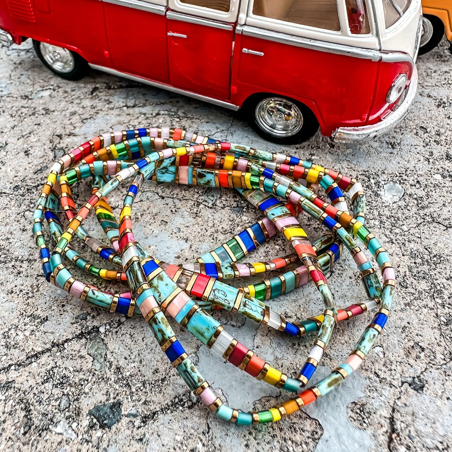 Colored tila beads stretch handmade bracelets made by Born to Rock Jewelry. Surf and sports inspired jewelry brand. A family-owned business that rocks! Based in San Diego California.