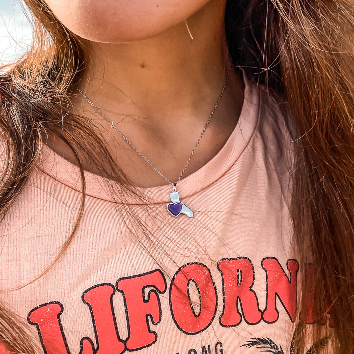 18Kt Yellow Gold Plated California State Pendant Necklace with a heart shaped Pink Howlite natural gemstone made by Born to Rock. Online Jewelry Store based in San Diego California