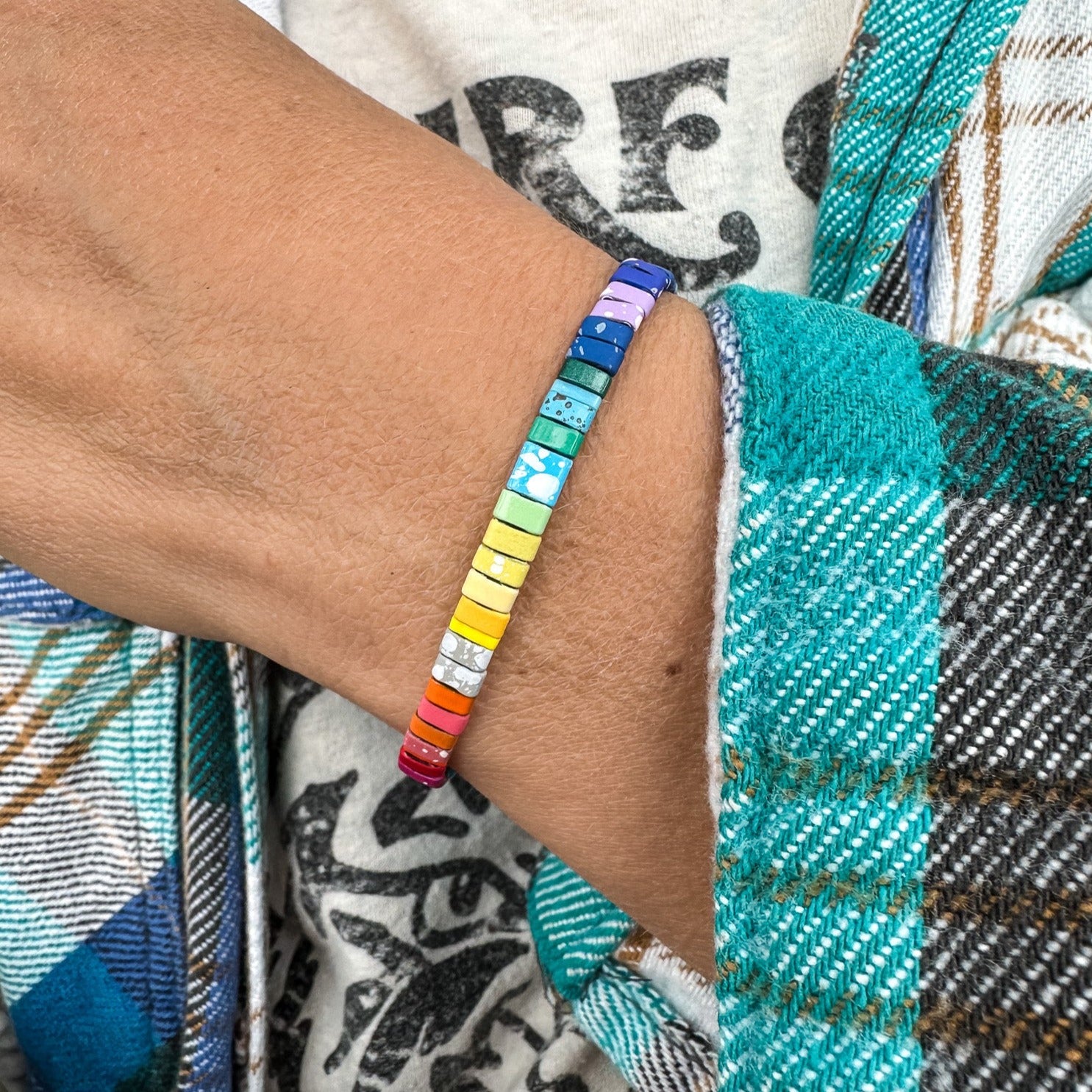 Colored tila beads stretch handmade bracelets made by Born to Rock Jewelry. Surf and sports inspired jewelry brand. A family-owned business that rocks! Based in San Diego California.