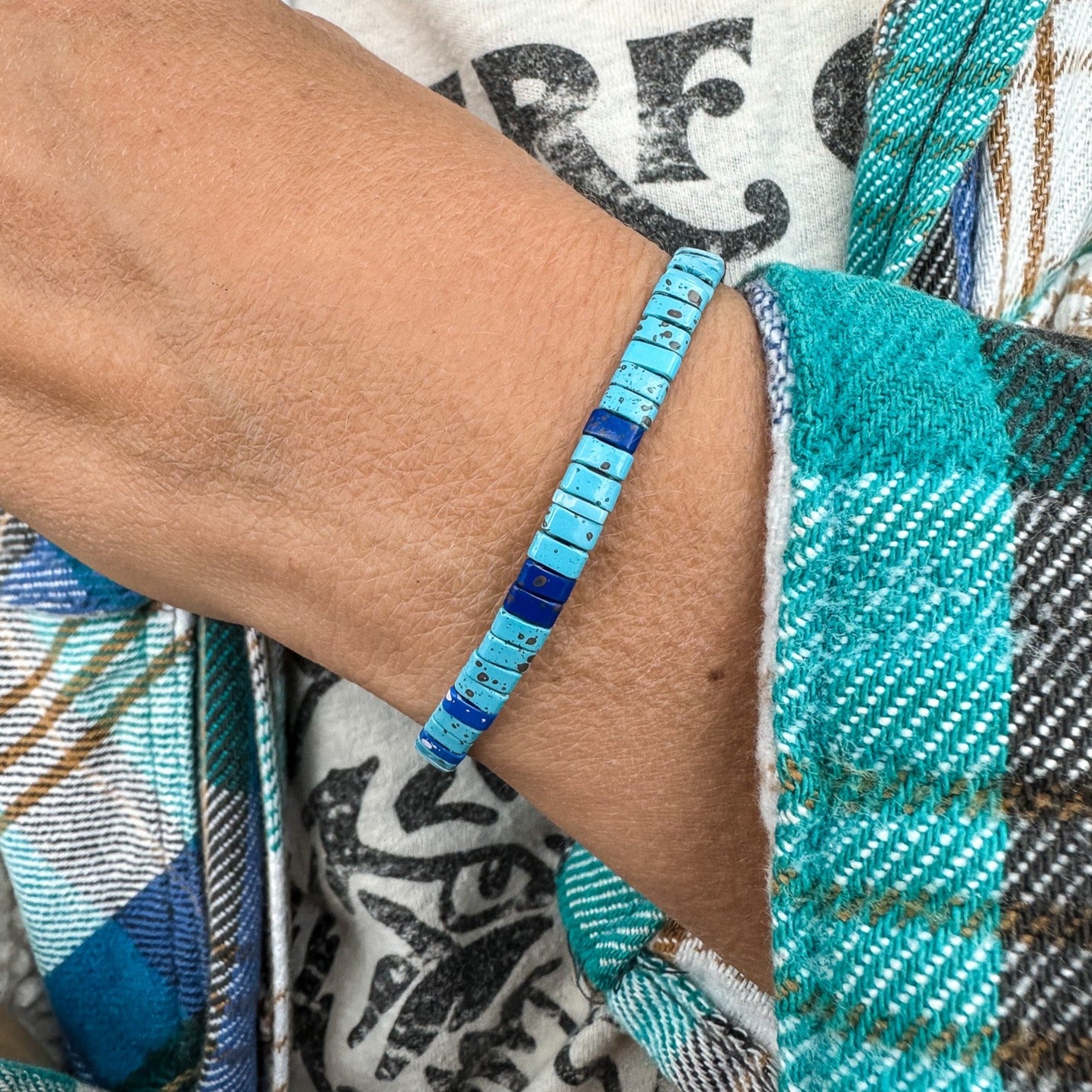 Colored tila beads stretch handmade bracelets made by Born to Rock Jewelry. Surf and sports inspired jewelry brand. A family-owned business that rocks! Based in San Diego California.
