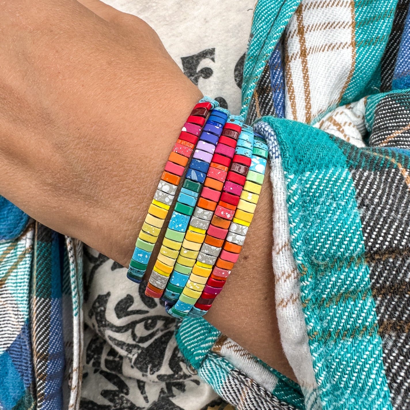 Colored tila beads stretch handmade bracelets made by Born to Rock Jewelry. Surf and sports inspired jewelry brand. A family-owned business that rocks! Based in San Diego California.