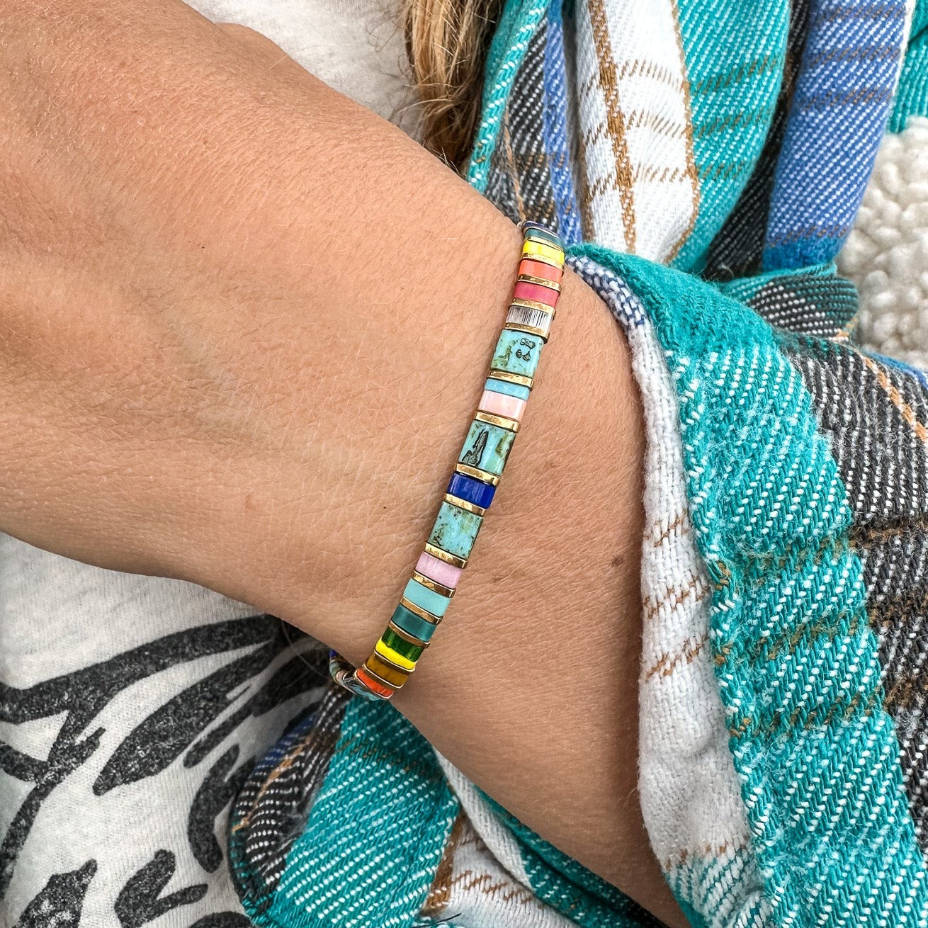 Colored tila beads stretch handmade bracelets made by Born to Rock Jewelry. Surf and sports inspired jewelry brand. A family-owned business that rocks! Based in San Diego California.