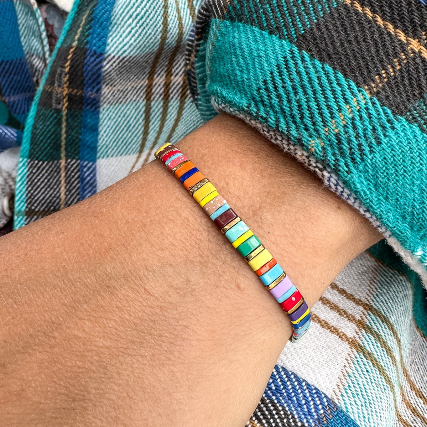Colored tila beads stretch handmade bracelets made by Born to Rock Jewelry. Surf and sports inspired jewelry brand. A family-owned business that rocks! Based in San Diego California.