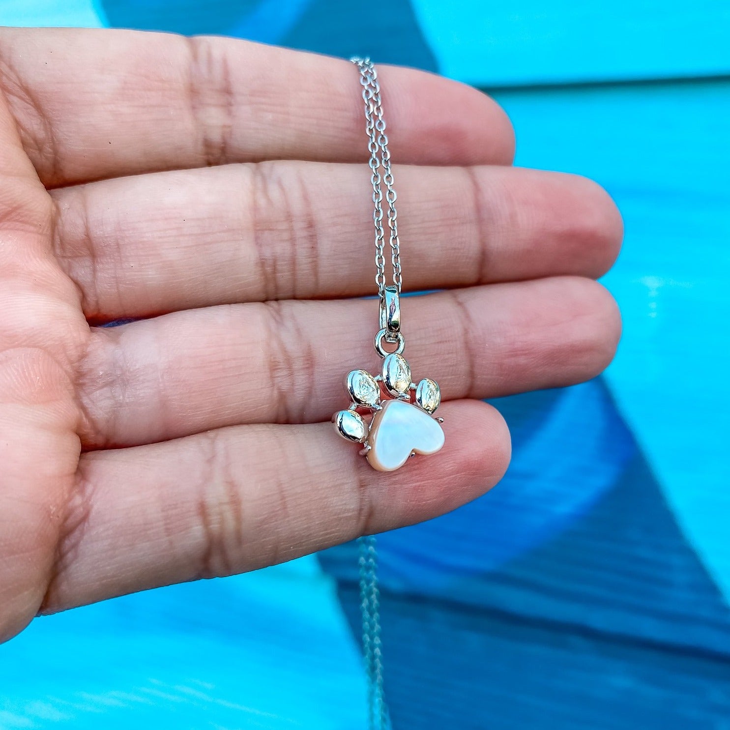 Pet Paw Charm Necklace in Mother-of-pearl. Best gift for pet moms and pet lovers. Made by Born to Rock Jewelry