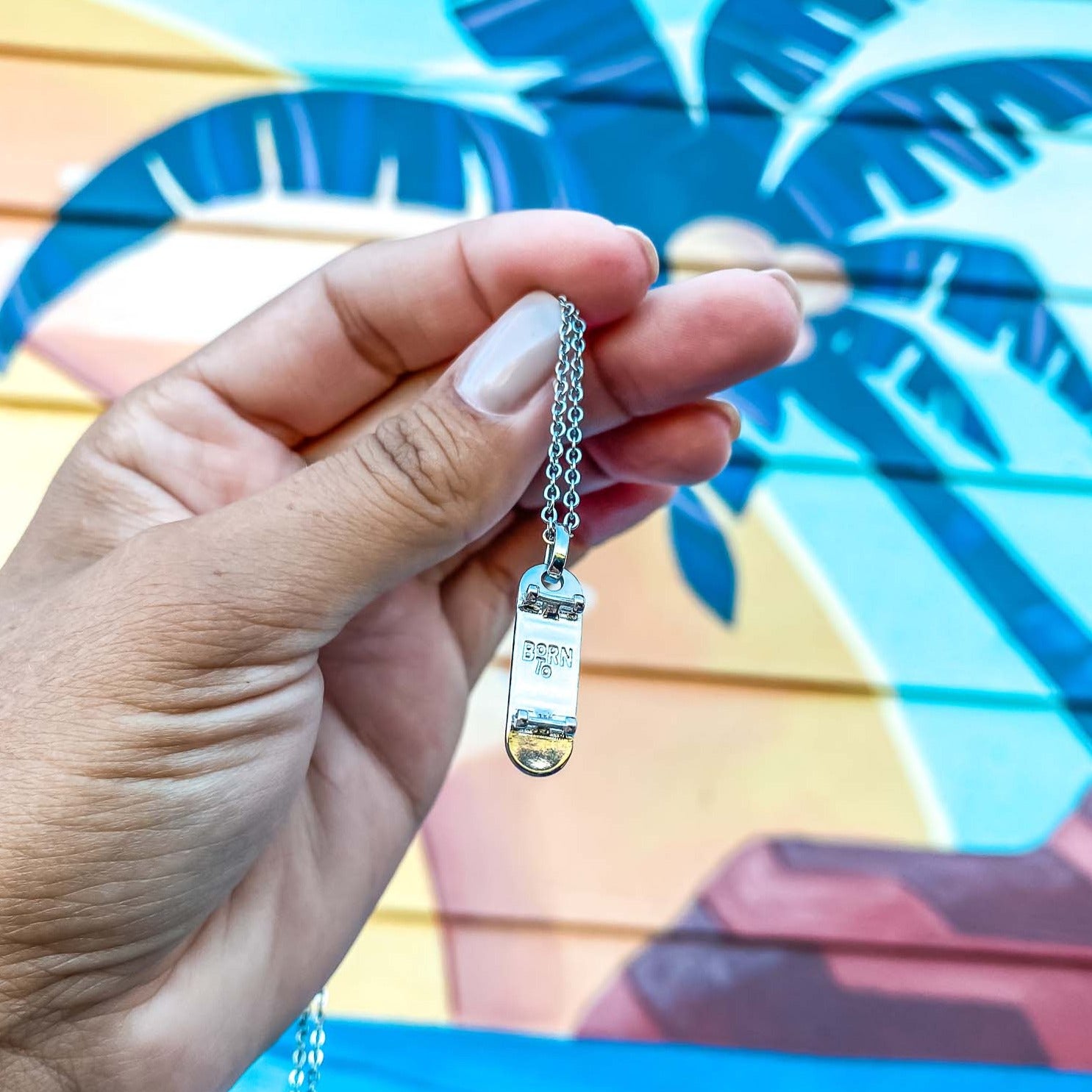 silver plated skateboard charm necklace handmade by born to rock jewelry