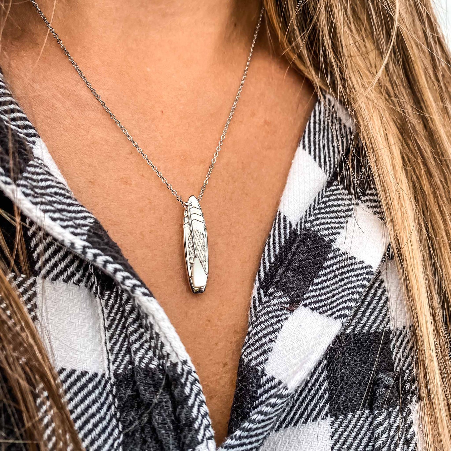 Looking for places to buy or rent a paddle board? This stand up paddle board pendant will be the best and highest performance SUP you'll ever find. Take your paddle board with you, even when you're not surfing, racing or touring. Shop June's birthstone SUP jewelry online or at a surf shop near you.