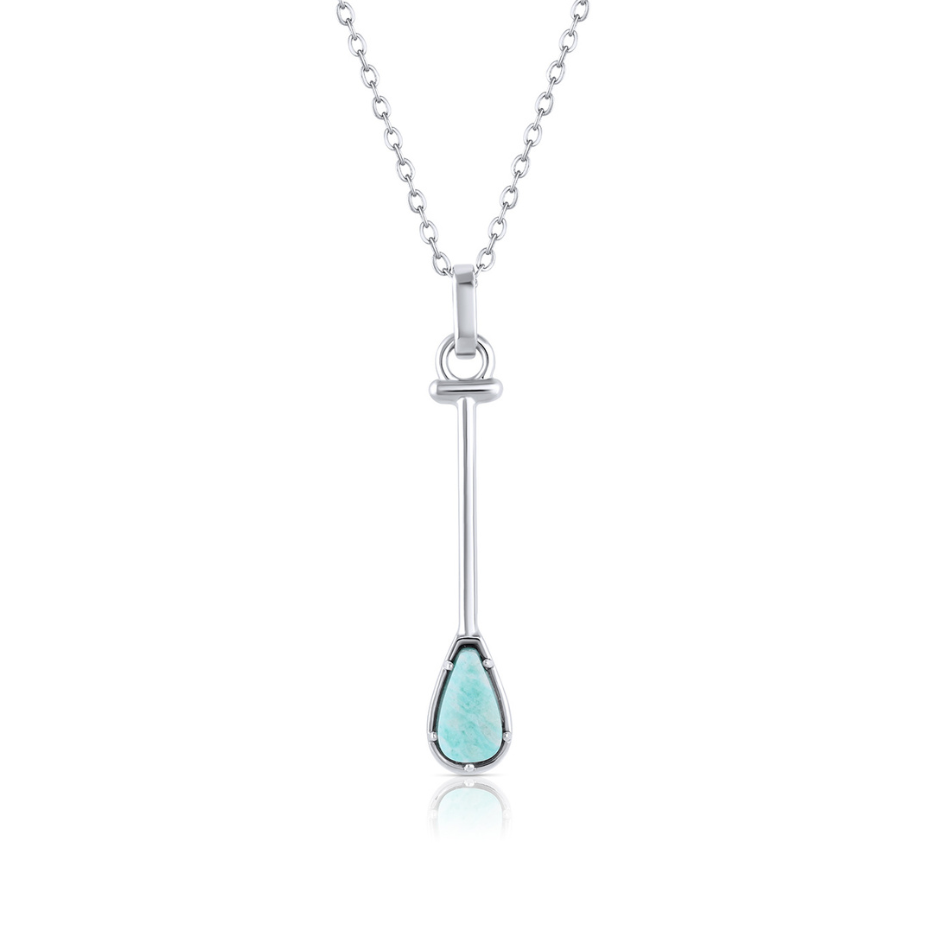 Silver necklace with a turquoise pendant on a white background