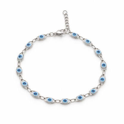 Silver bracelet with blue stones on a white background