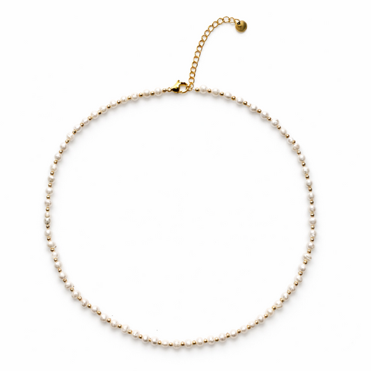 Gold necklace with small feshwater pearls and round gold stainless steel beads
