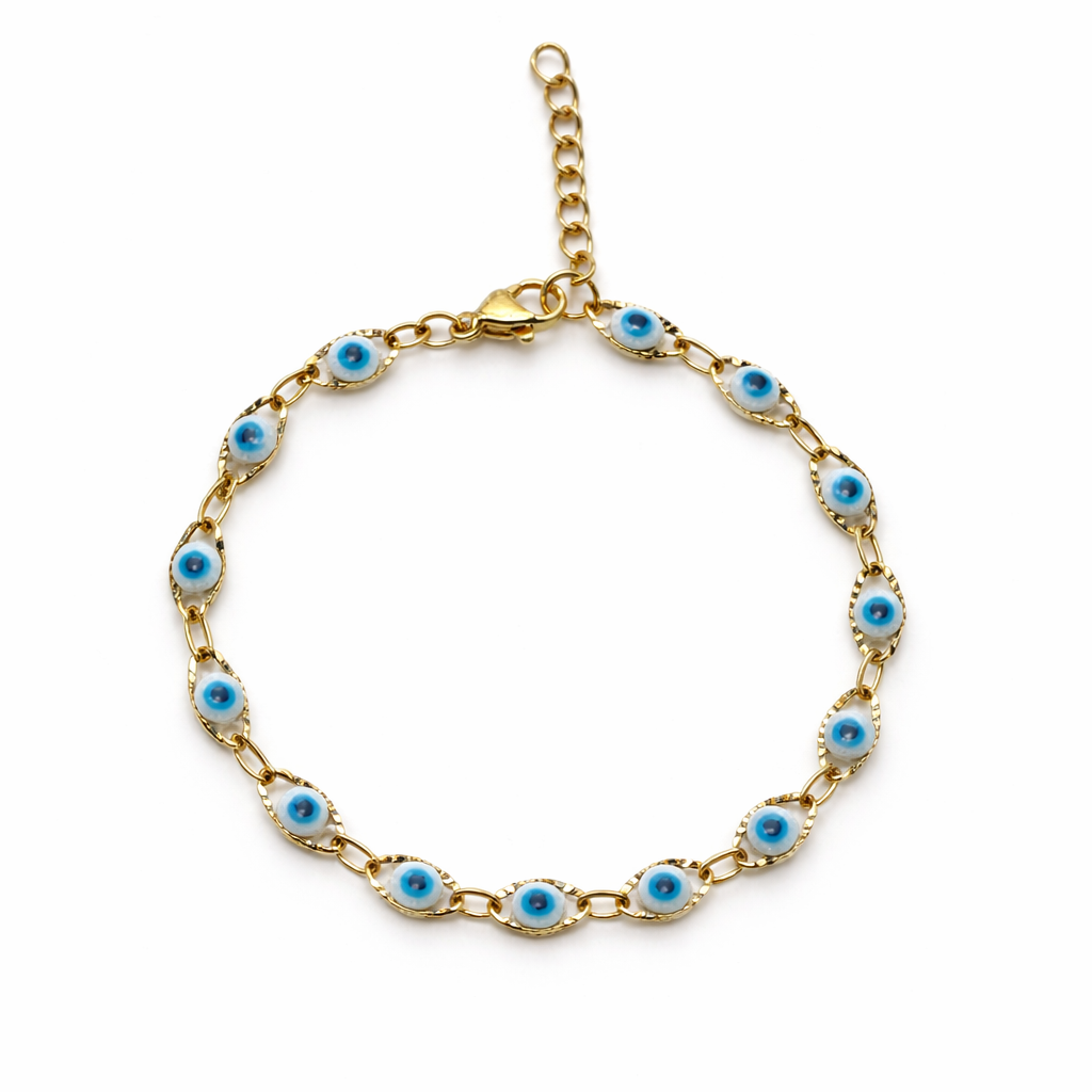 Gold bracelet with blue and white evil eye beads on a white background