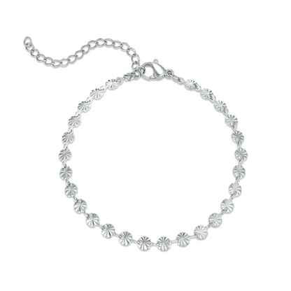 Silver bracelet with floral links on a white background