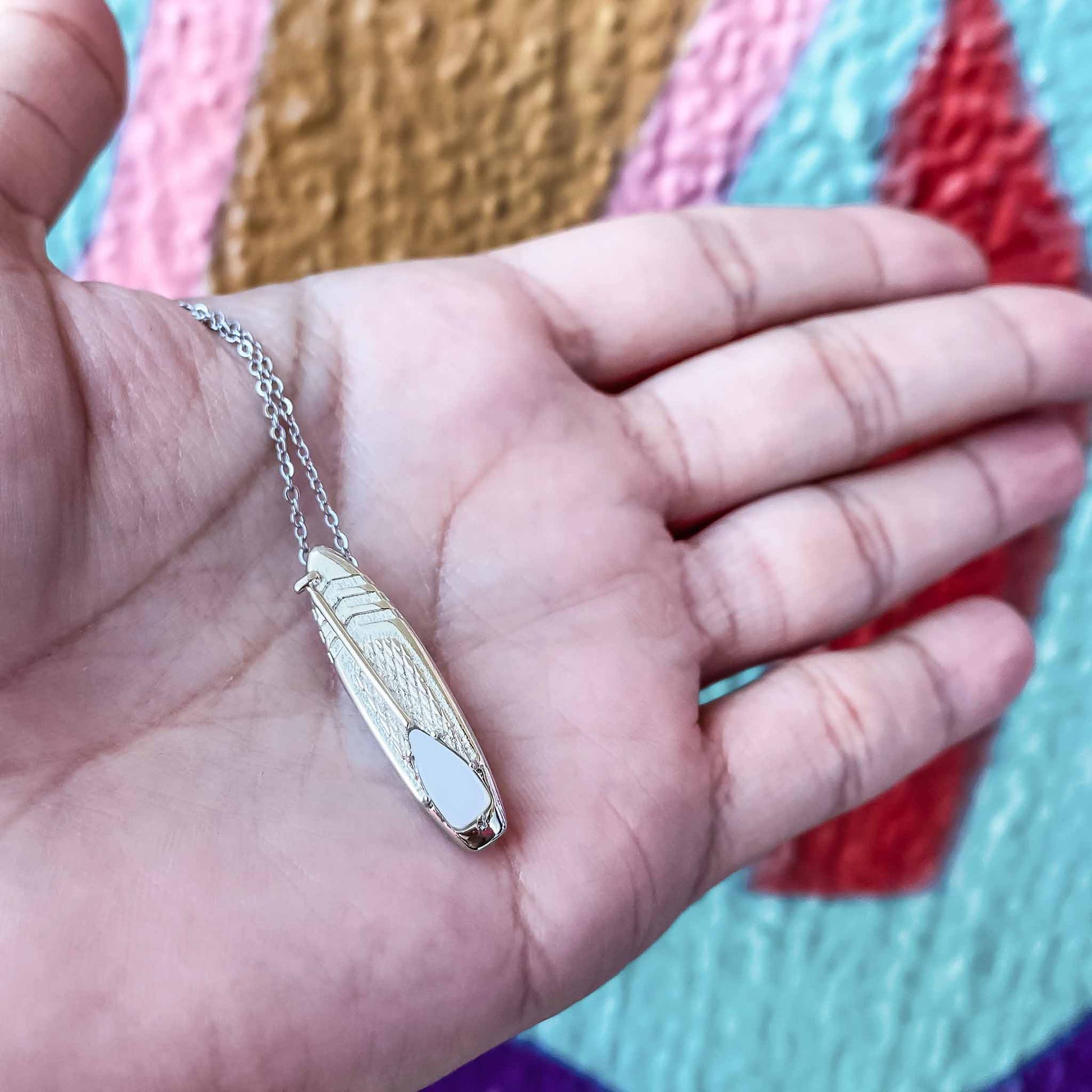 Looking for places to buy or rent a paddle board? This stand up paddle board pendant will be the best and highest performance SUP you'll ever find. Take your paddle board with you, even when you're not surfing, racing or touring. Shop June's birthstone SUP jewelry online or at a surf shop near you.