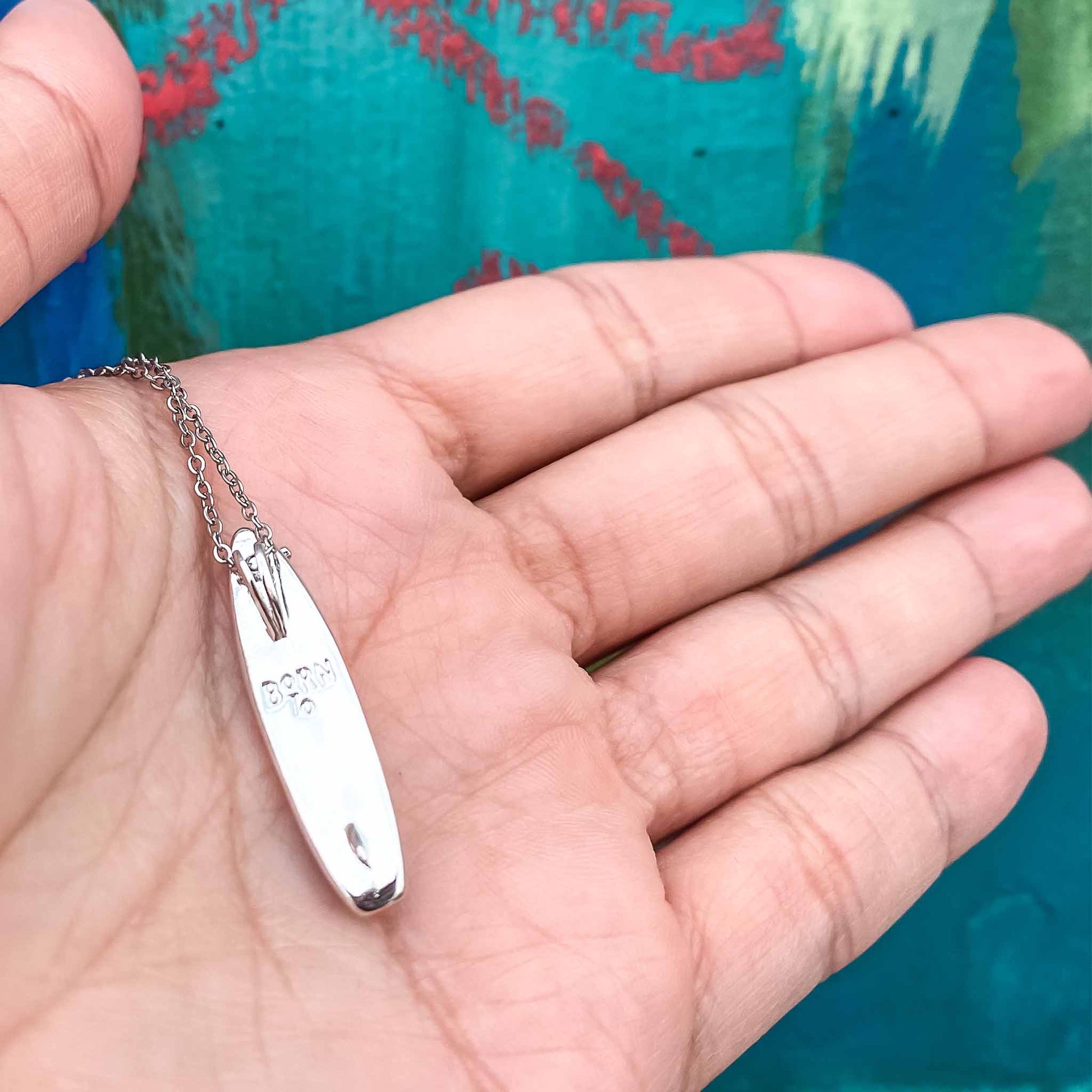 Looking for places to buy or rent a paddle board? This stand up paddle board pendant will be the best and highest performance SUP you'll ever find. Take your paddle board with you, even when you're not surfing, racing or touring. Shop September's birthstone SUP jewelry online or at a surf shop near you