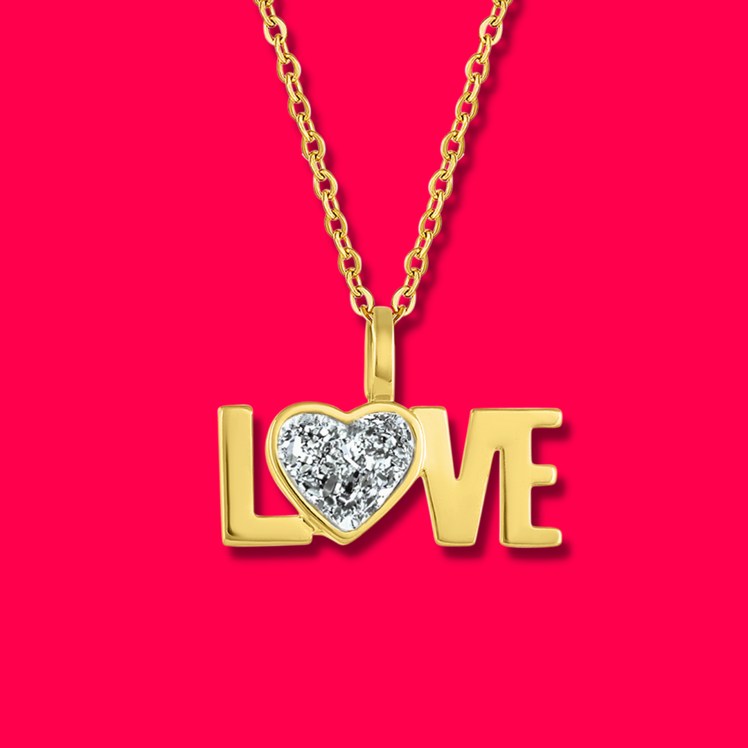 18kt Yellow Gold Love word charm necklace with a heart shaped natural Quartz Druzy Crystal made by Born to Rock. Online Jewelry store based in San Diego California