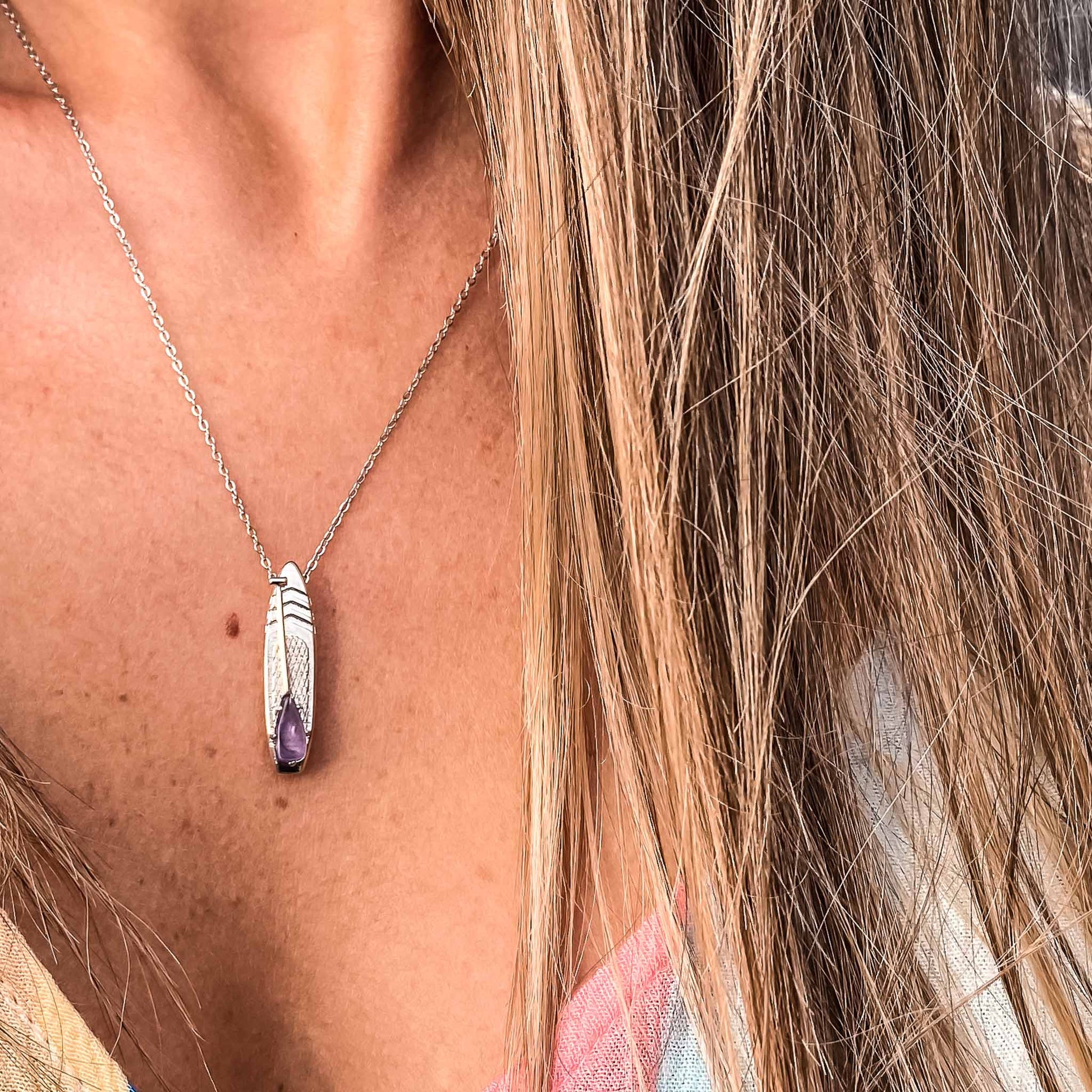 Looking for places to buy or rent a paddle board? This stand up paddle board pendant will be the best and highest performance SUP you'll ever find. Take your paddle board with you, even when you're not surfing, racing or touring. Shop February's birthstone SUP jewelry online or at a surf shop near you.