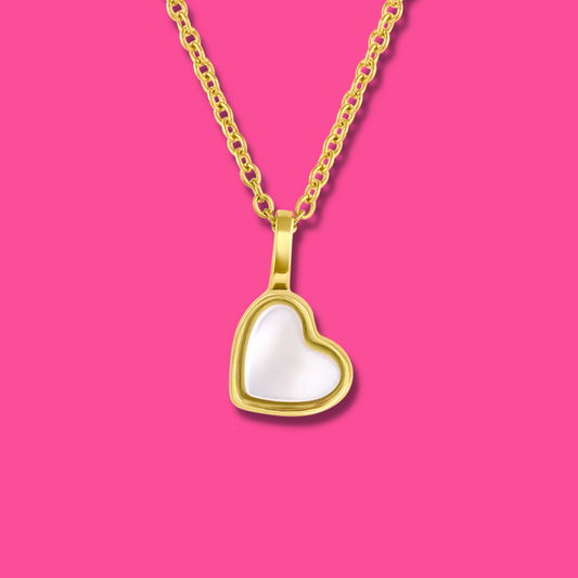 Yellow Gold plated charm necklace with a heart shaped mother-of-pearl pendant. Wedding and bridal jewelry. Great gift fro brides, bridesmaid and maid of honor made by Born to Rock . Jewelry store based in San Diego California