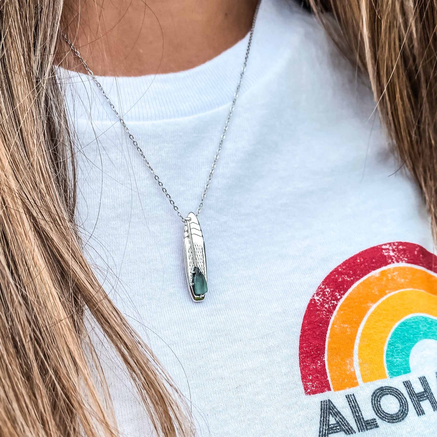 Looking for places to buy or rent a paddle board? This stand up paddle board pendant will be the best and highest performance SUP you'll ever find. Take your paddle board with you, even when you're not surfing, racing or touring. Shop May's birthstone SUP jewelry online or at a surf shop near you.