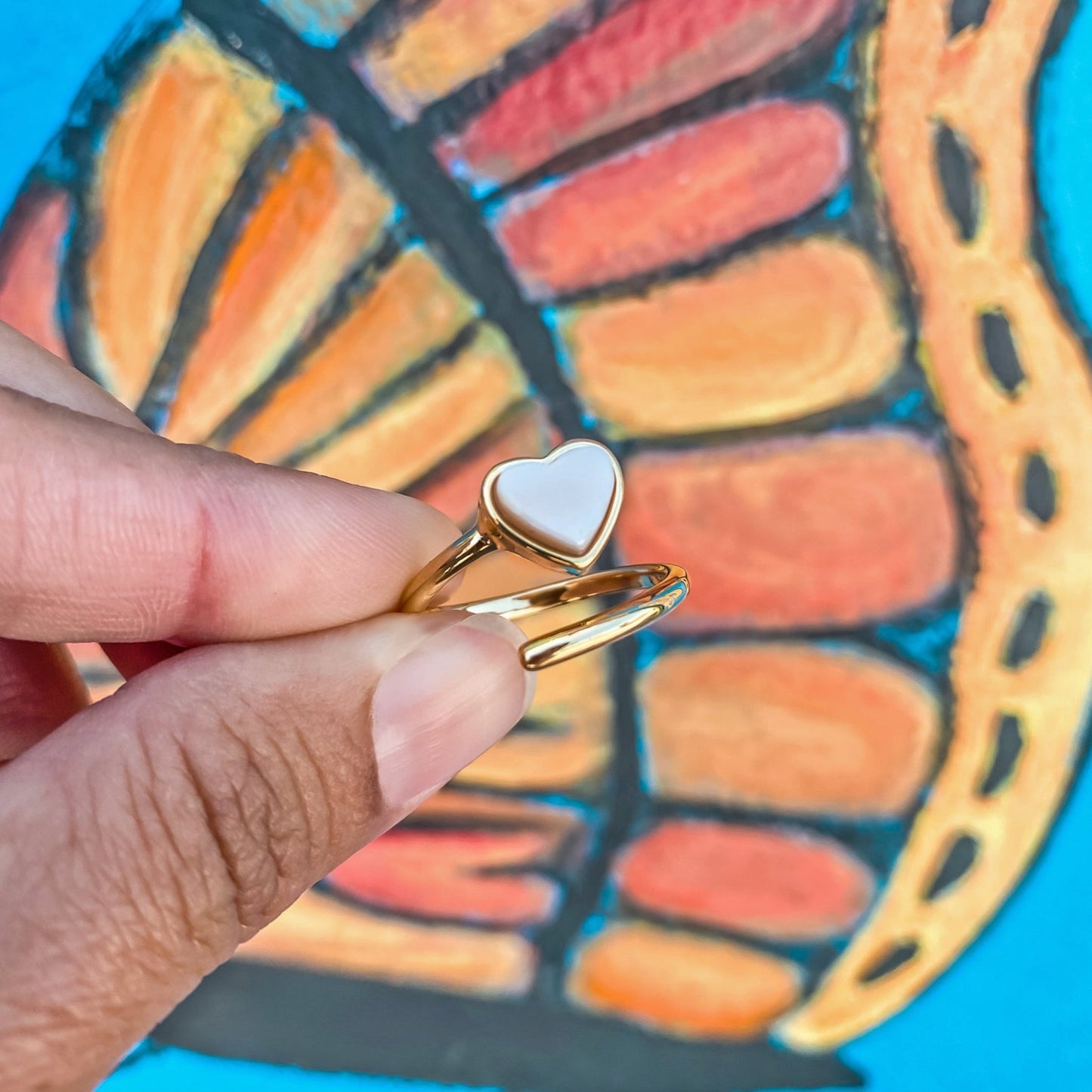 Yellow gold adjustable ring with a heart shaped mother-of-pearl. Wedding and bridal jewelry. Great gift for brides, bridesmaid and maid of honor. Made by  Born to Rock. Online Jewelry store based in San Diego California