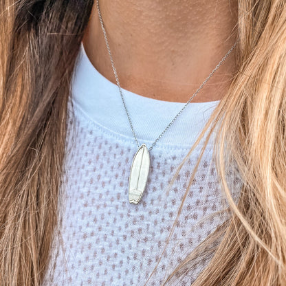 Silver plated surfboard charm necklace made by Born to Rock jewelry. Online jewelry store based in San Diego California. Great gift for surfers