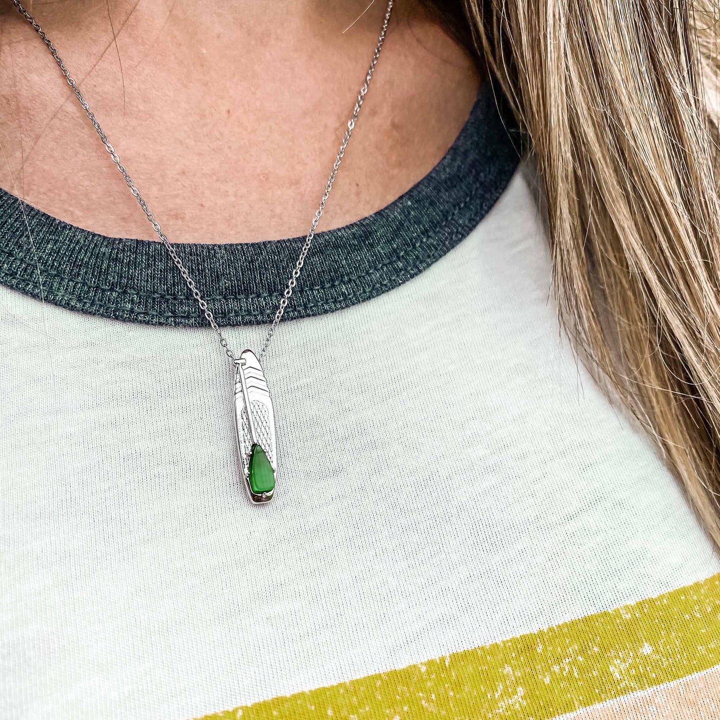 Looking for places to buy or rent a paddle board? This stand up paddle board pendant will be the best and highest performance SUP you'll ever find. Take your paddle board with you, even when you're not surfing, racing or touring. Shop August's birthstone SUP jewelry online or at a surf shop near you