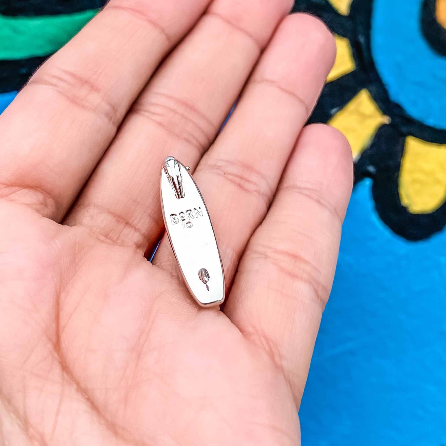 Looking for places to buy or rent a paddle board? This stand up paddle board pendant will be the best and highest performance SUP you'll ever find. Take your paddle board with you, even when you're not surfing, racing or touring. Shop August's birthstone SUP jewelry online or at a surf shop near you