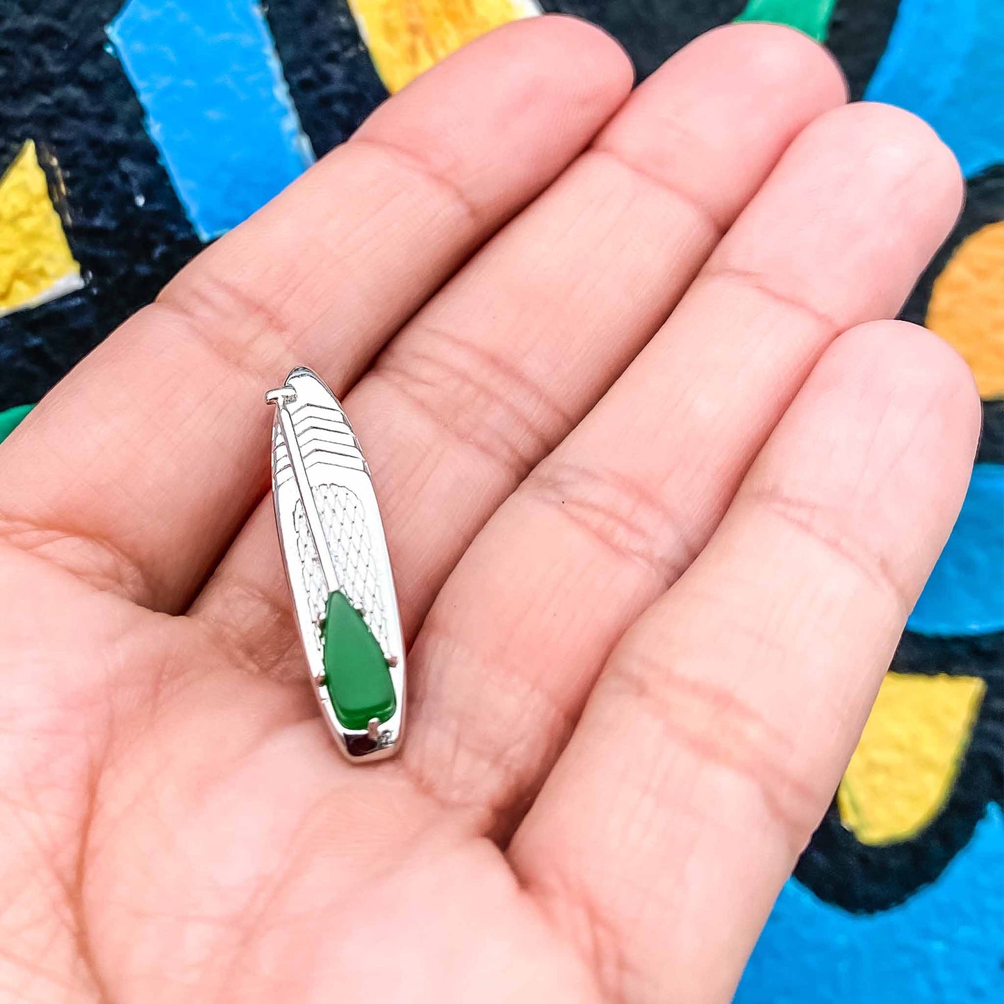 Looking for places to buy or rent a paddle board? This stand up paddle board pendant will be the best and highest performance SUP you'll ever find. Take your paddle board with you, even when you're not surfing, racing or touring. Shop August's birthstone SUP jewelry online or at a surf shop near you